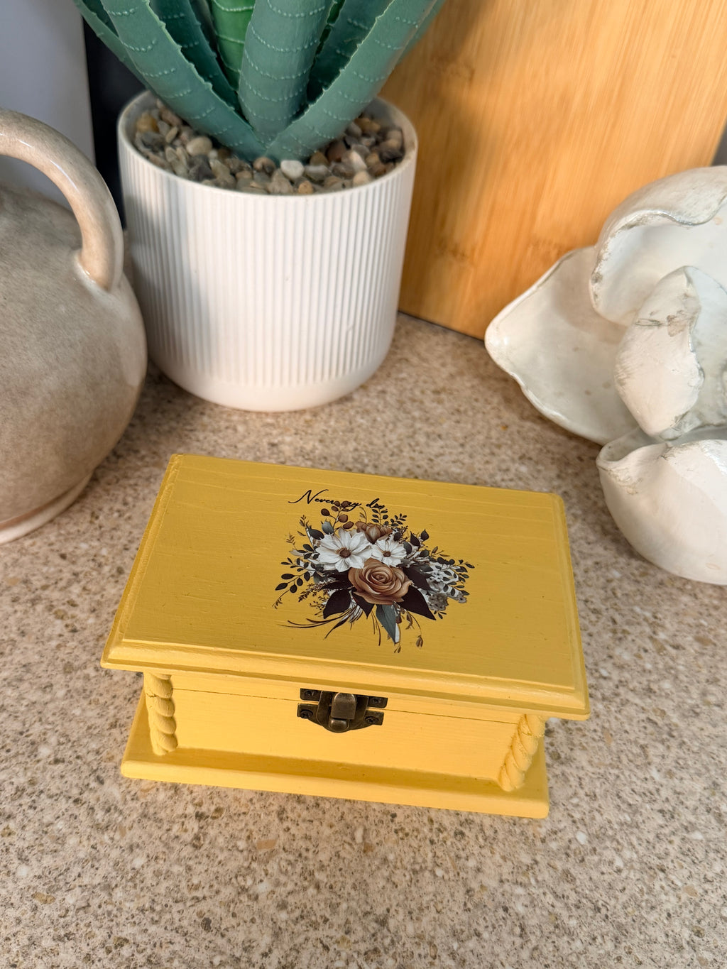 Yellow wooden trinket box
