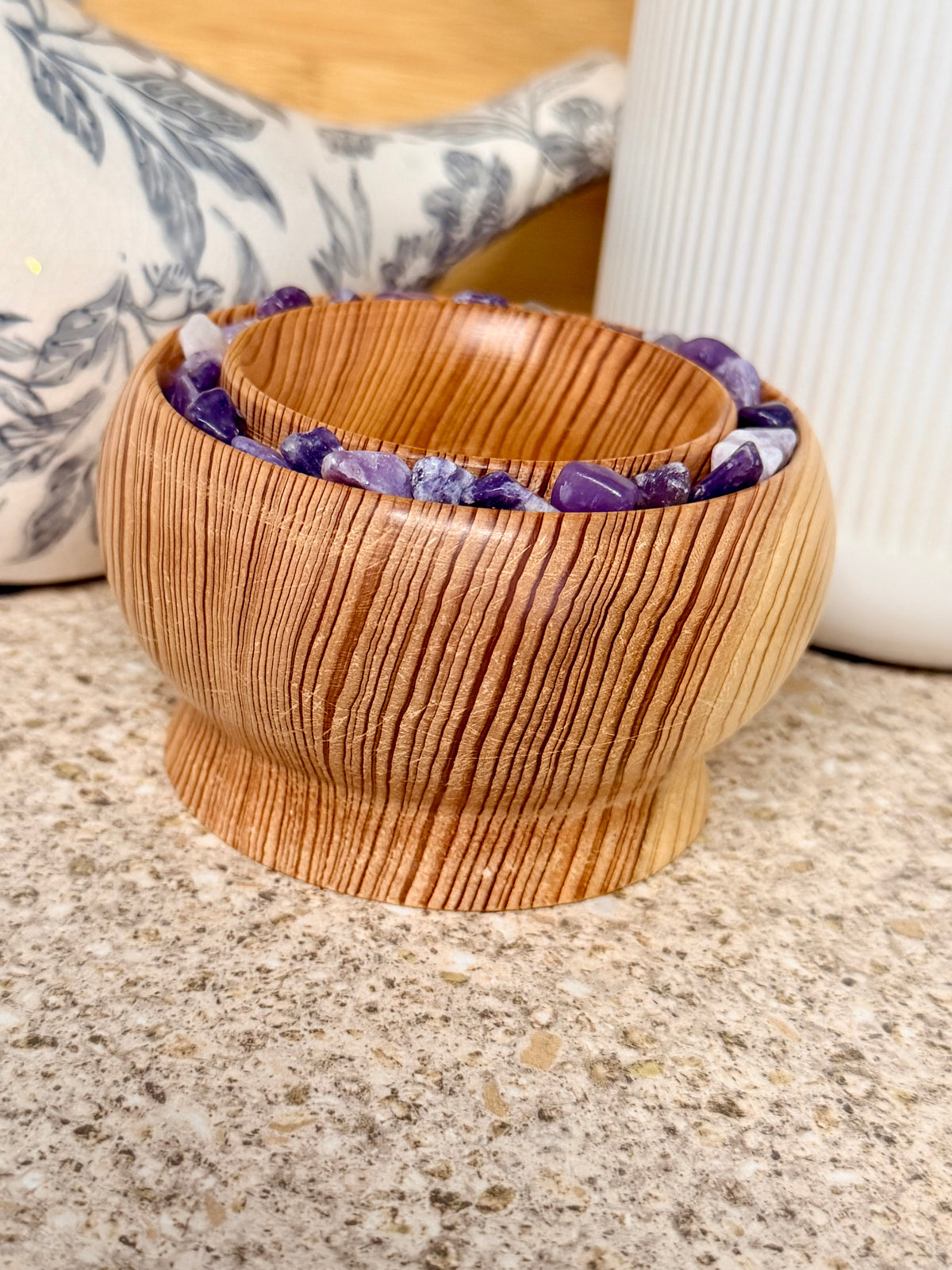 Hand turned silver fir wooden bowl with lepidolite stones