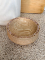 Hand turned pine wooden bowl with rose quartz crystals