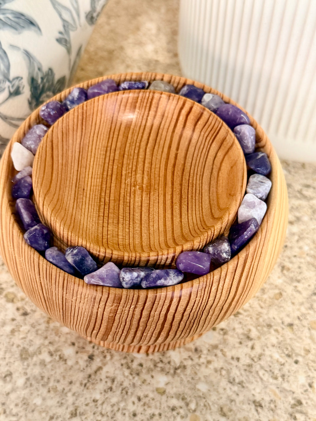 Hand turned silver fir wooden bowl with lepidolite stones
