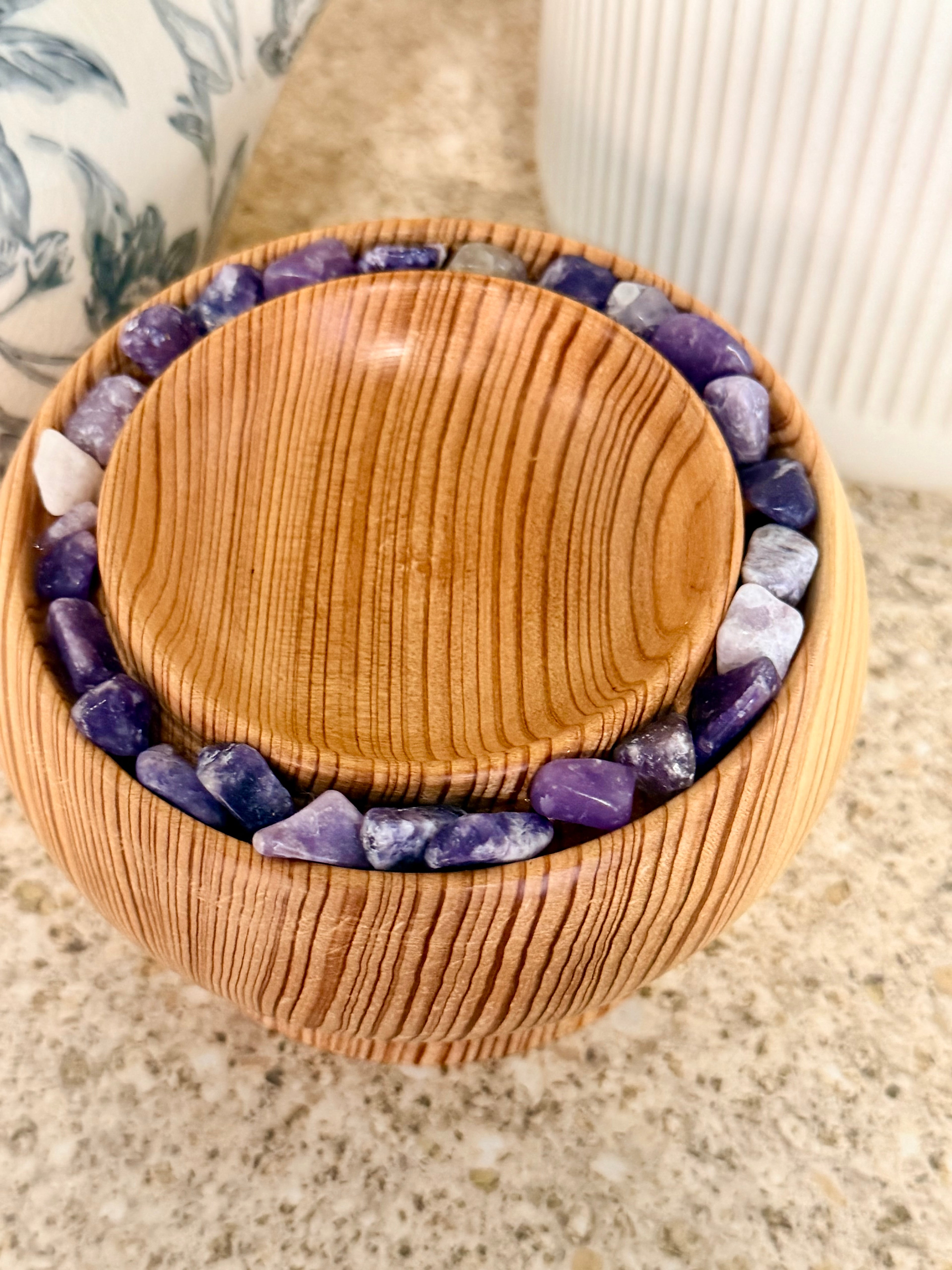 Hand turned silver fir wooden bowl with lepidolite stones