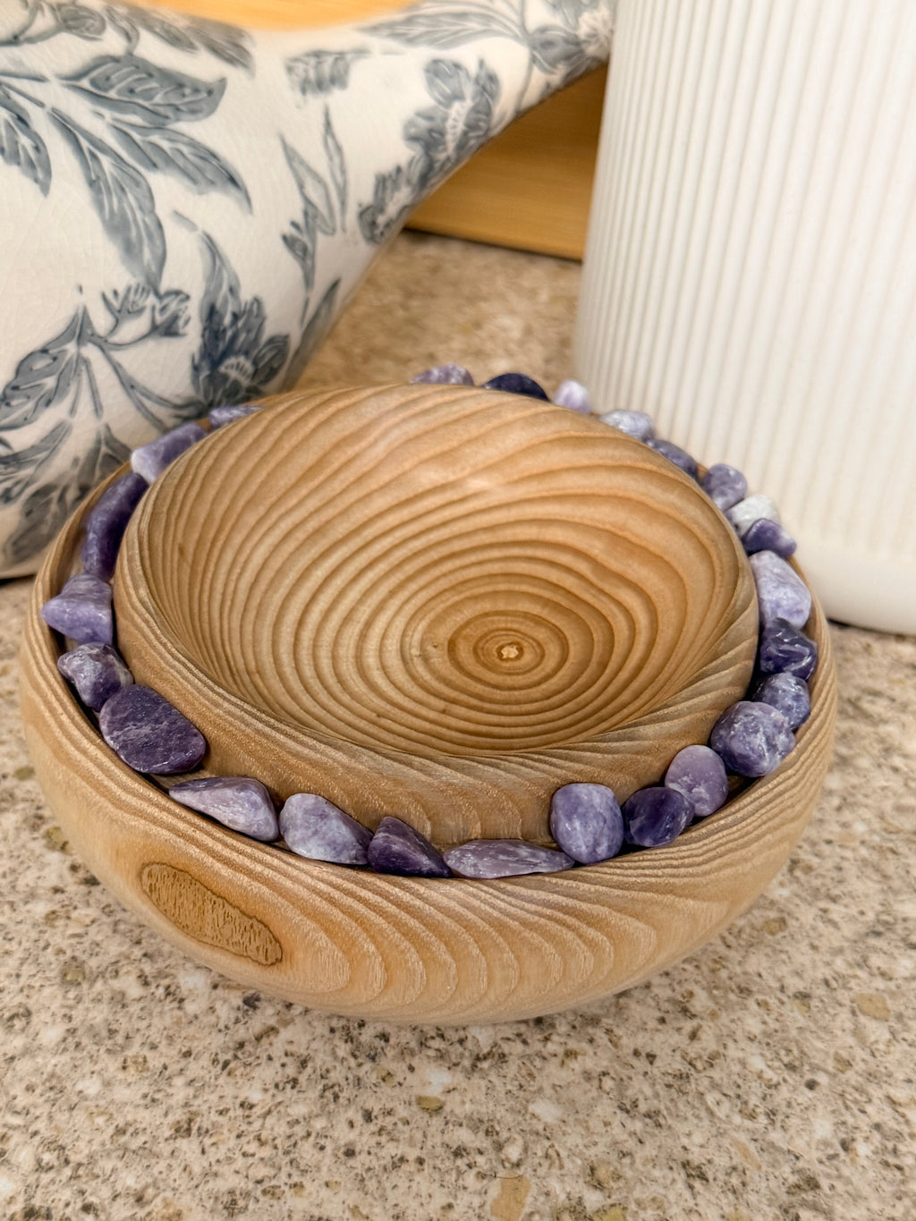 Hand turned ash wooden bowl with lepidolite stones