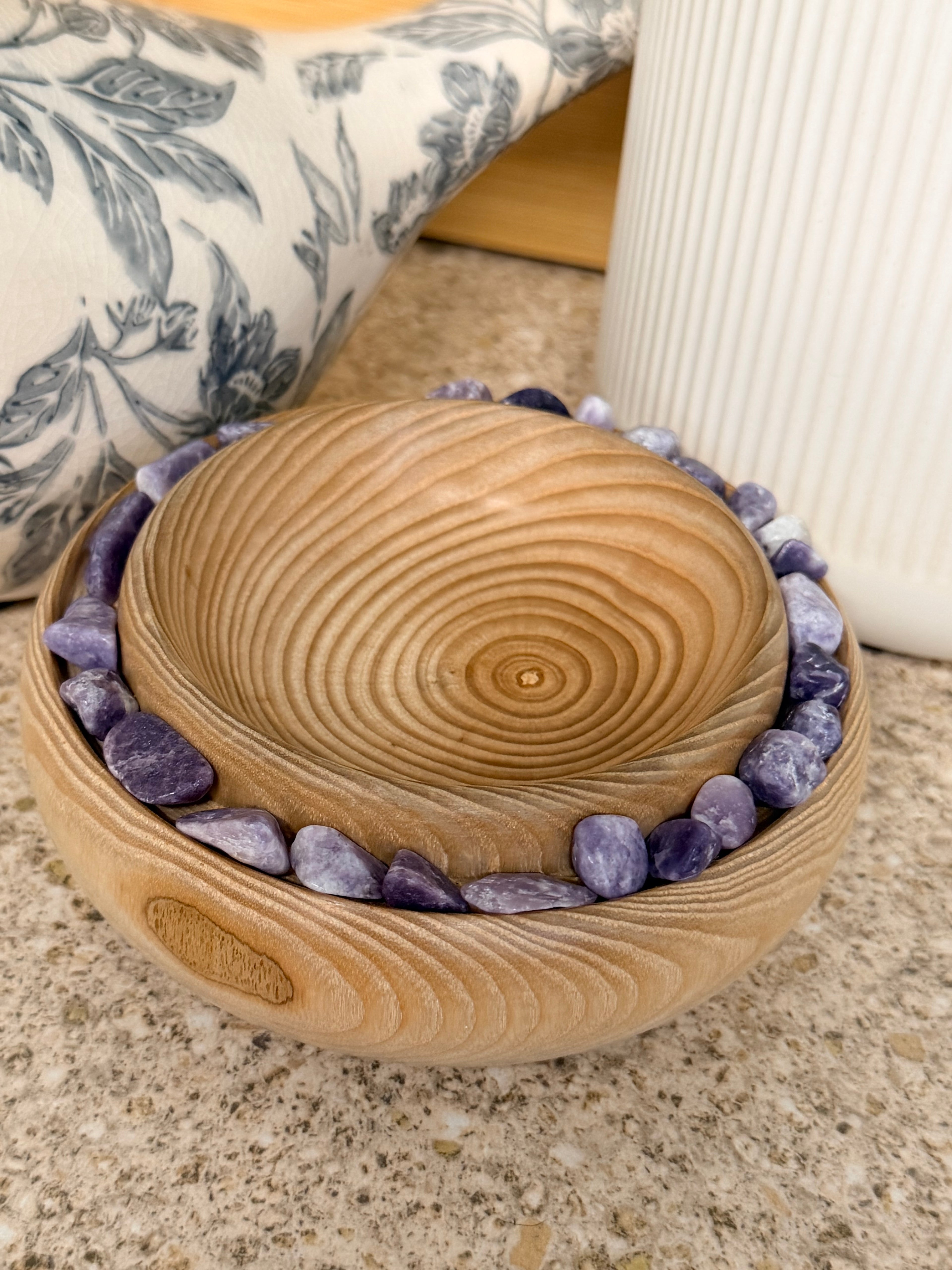 Hand turned ash wooden bowl with lepidolite stones