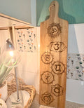 Hand woodburnt chakra chopping/serving board