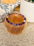 Hand turned silver fir wooden bowl with lepidolite stones