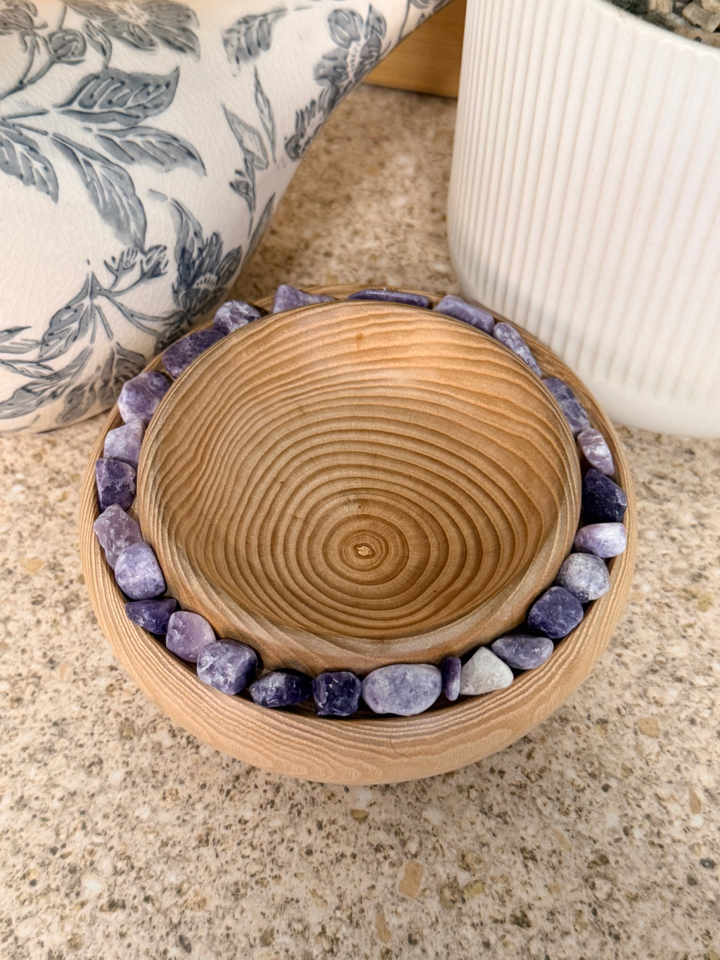 Hand turned ash wooden bowl with lepidolite stones
