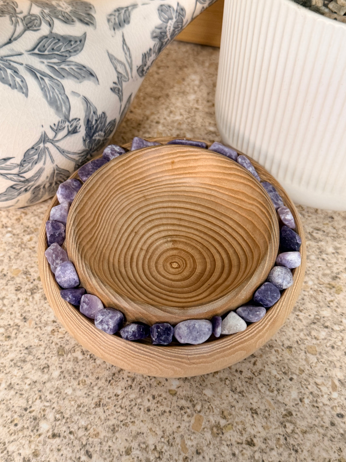 Hand turned ash wooden bowl with lepidolite stones